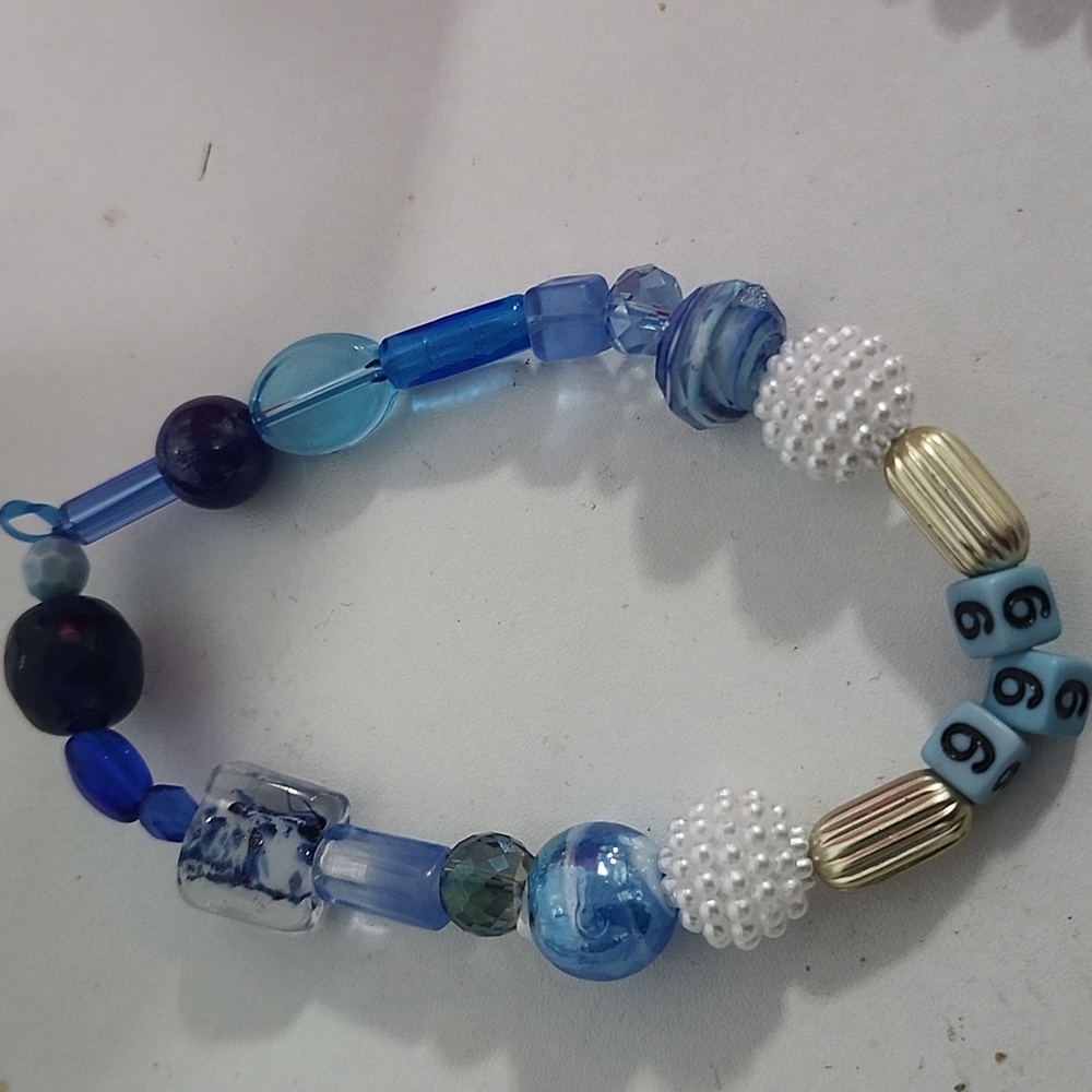 Hand crafted, blue 999/666 harmonious bracelet